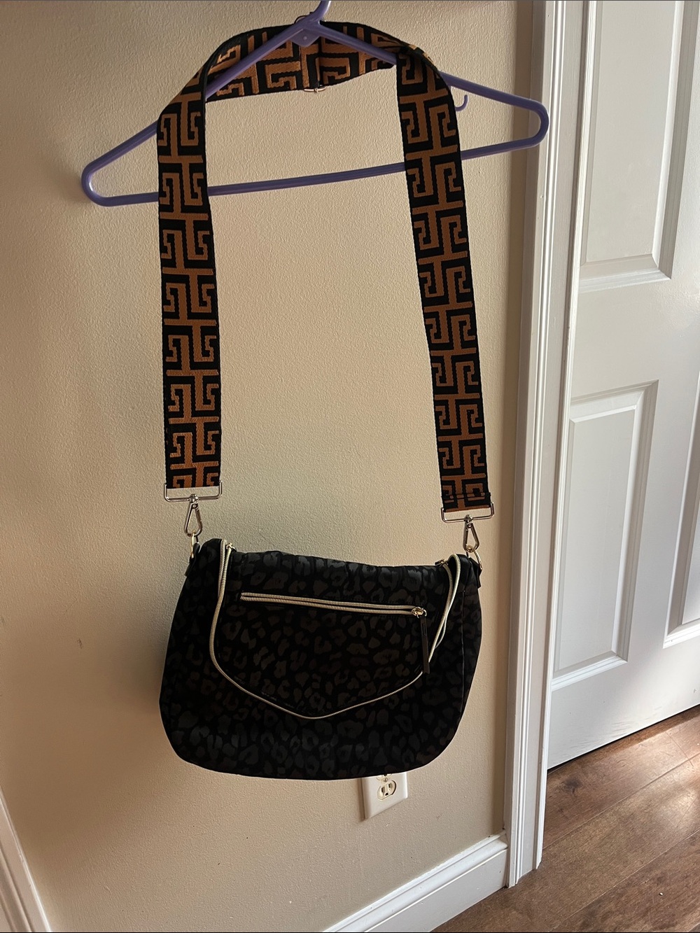 Black Leopard-Print Crossbody Bag with Patterned Strap